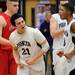 Pioneer High School's Ethan Spencer and Duane Simpson-Redmond react to a foul against Bedford High School during the fourth quarter at Pioneer on Tuesday, Feb. 19, 2013. Melanie Maxwell I AnnArbor.com